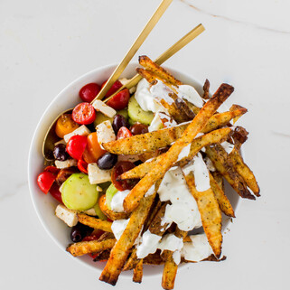 Crispy Greek-style Idaho® Potato Fries with Greek Salad and Tzatziki Sauce