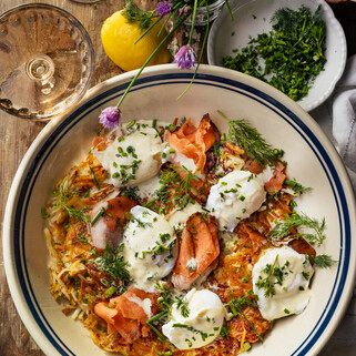 Herby Salmon Lox Eggs Benedict on Crispy Potato Hashbrowns