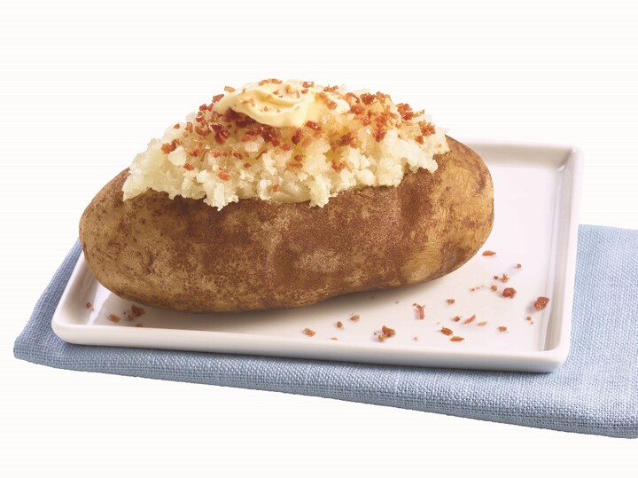 The Ultimate Baked Potato With Butter and Bacon Toppings