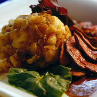 Leg of Lamb with Sautéed Idaho® Potatoes