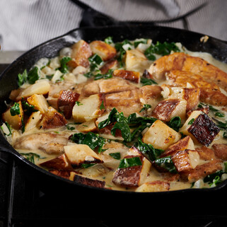 Chicken and Potatoes with Garlic Parmesan Cream Sauce for Idaho® Potatoes 