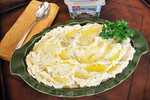 Slow Cooker White Cheddar, Garlic & Chive Idaho® Mashed Potatoes