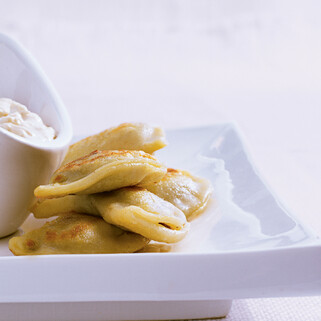Idaho® Potato & Short Rib Pierogi with Caramelized Onion Sour Cream