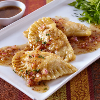 Idaho® Potato Pastrami Pierogi with Mustard Brown Vinaigrette