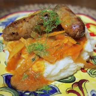Sausage, Fennel & Onions over Whipped Pecorino Idaho® Potato 