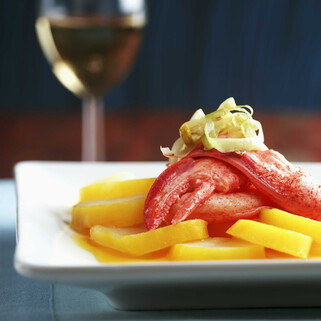 Saffron Scented Potato Medallions with Lobster and Passion Fruit Vinaigrette