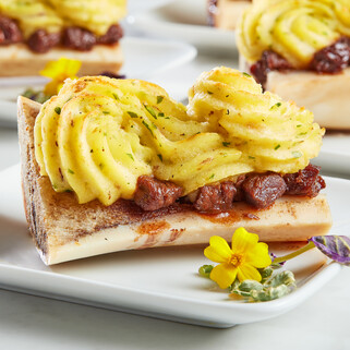 Bone Marrow Duchess Potatoes with Braised Beef Cheeks