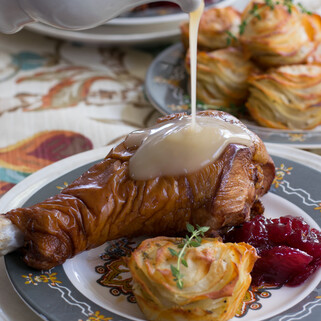 Brined and Smoked Turkey Drumsticks With Cheesy Idaho® Potato Stacks 