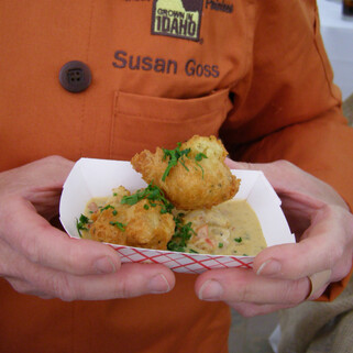 Crispy Idaho® Potato Beignets with Creole Barbecued Shrimp