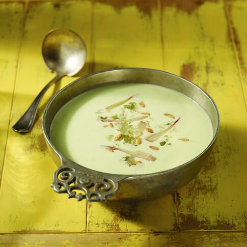 Potato and Ramp Green Soup with Candied Pine Nuts and Creme Fraiche