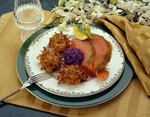 Dill Cured Salmon Graviax with Caraway Idaho® Potato Cakes, Pickled Red Cabbage & Horseradish Ver Jus