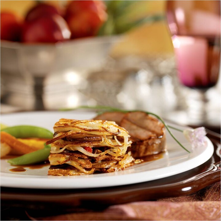 Grilled Veal Loin Medallions with Mushroom and Idaho® Potato Galette and Calvados Veal Reduction