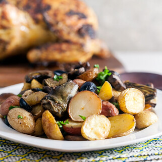 Roast Idaho® Potatoes with Artichokes, Mushrooms and Olives 
