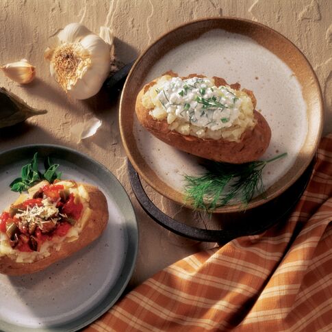Baked Idaho® Potato with Herbed Cottage Cheese and Baked Idaho® Potato with Eggplant Parmigiana Topping