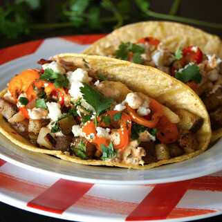 Tackling Tater Tacos with Honey Chipotle Slaw and Chorizo Crema