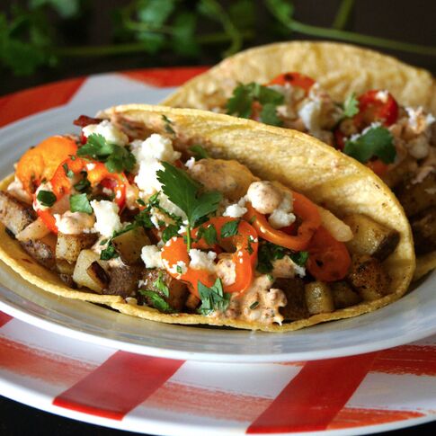 Tackling Tater Tacos with Honey Chipotle Slaw and Chorizo Crema