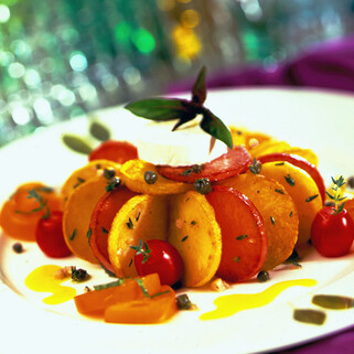 Grilled Idaho® Potato Salad with Warm Goat Cheese and Yellow Tomato Vinaigrette