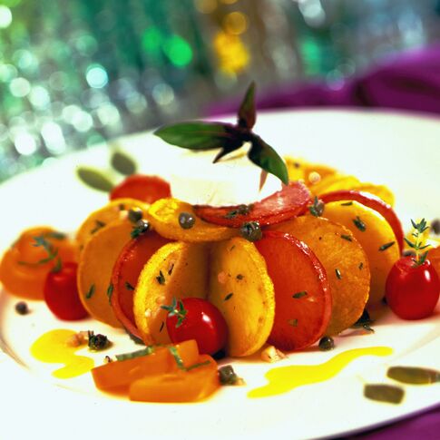 Grilled Idaho® Potato Salad with Warm Goat Cheese and Yellow Tomato Vinaigrette