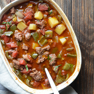 Easy Middle Eastern-Spiced Idaho® Potato, Bell Pepper, and Lamb Casserole with Pomegranate Molasses