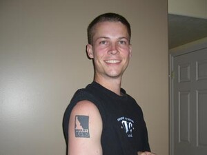 Air Force Sergeant with Roots in Idaho Tattoos "Grown in Idaho" Seal on Arm