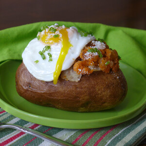 Baked Idaho® Potato with Chorizo, Green Onions, Cotija Cheese and Fried Egg on Top