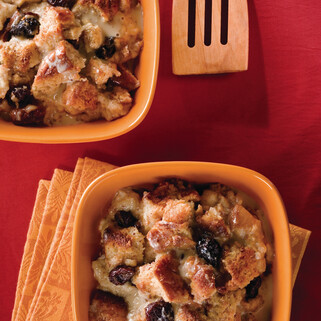 Idaho® Potato Bread Pudding With Marscapone, White Chocolate, Dried Cherries, and Praline Crème Anglaise