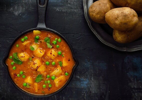 Curried Potatoes and Baby Peas (Tariwale Aloo)