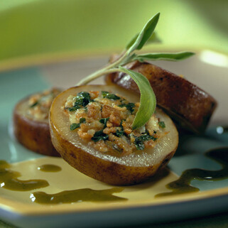 Roasted Idaho® Potato Medallion with Spinach, Brie and Spicy Pork Sausage 