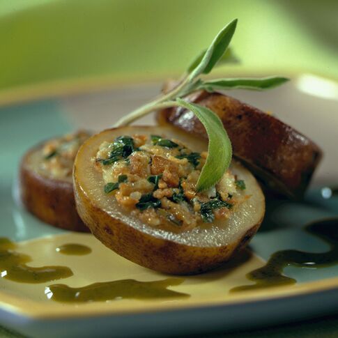 Roasted Idaho® Potato Medallion with Spinach, Brie and Spicy Pork Sausage 